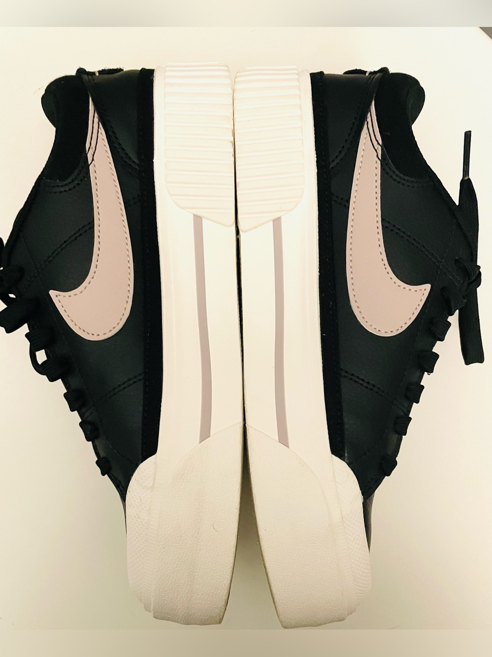 Nike Women's Black Sneakers with Light Pink Swoosh